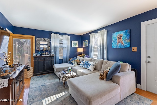 living room with wood finished floors