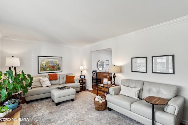 living room with crown molding and wood finished floors