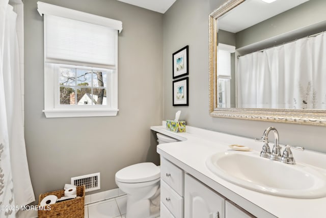 full bath featuring visible vents, baseboards, toilet, tile patterned floors, and vanity