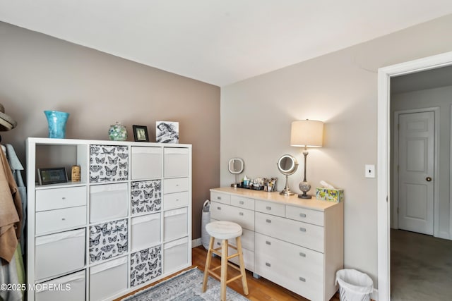 bedroom with wood finished floors