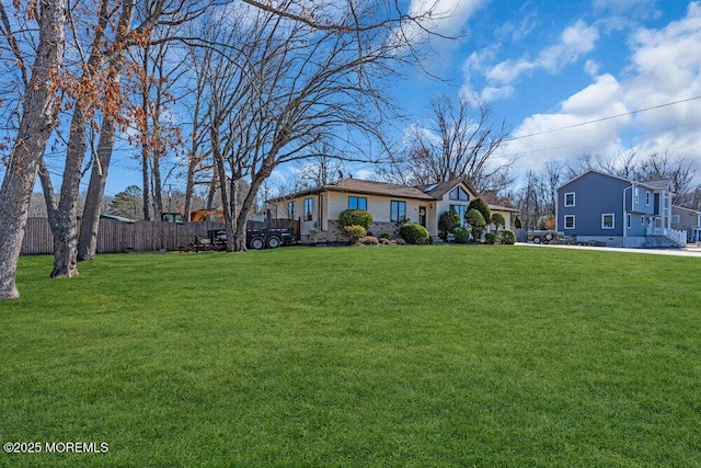 view of yard with fence