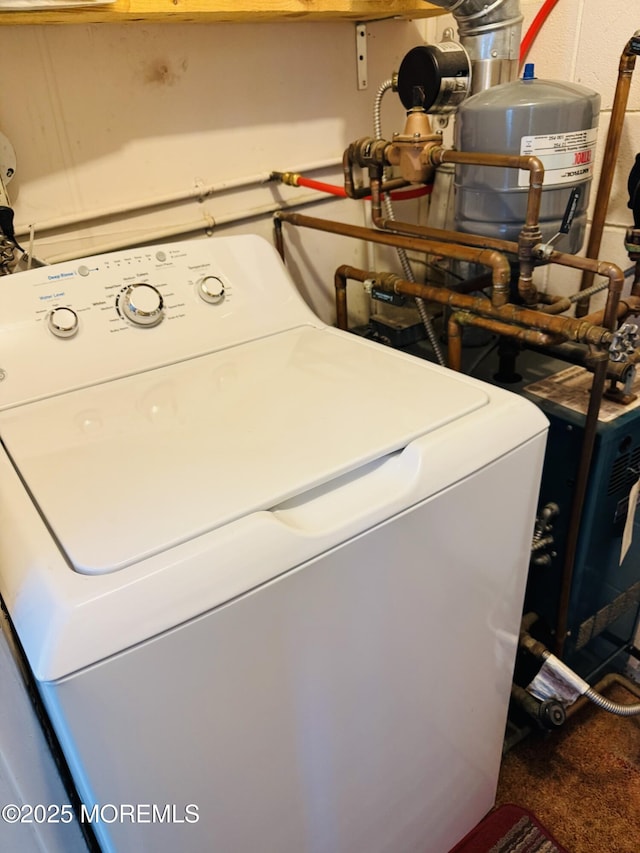 laundry area with washer / dryer and laundry area