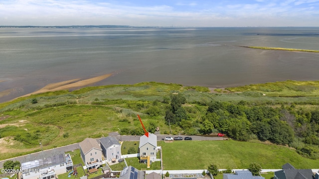 birds eye view of property featuring a residential view and a water view