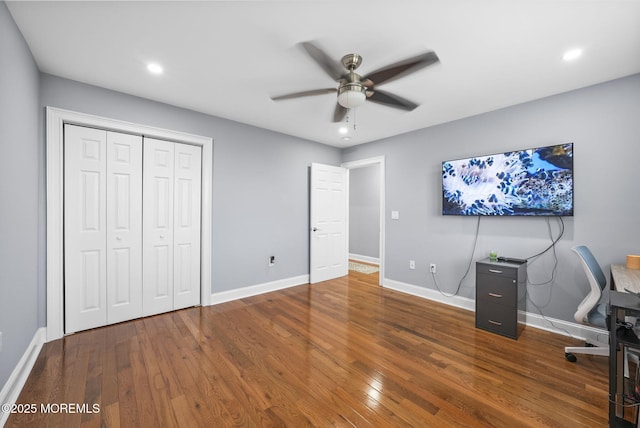 unfurnished office with recessed lighting, a ceiling fan, baseboards, and wood-type flooring