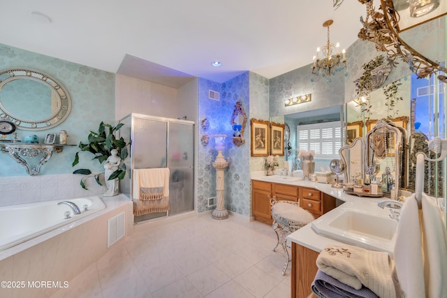 bathroom with a notable chandelier, a sink, a shower stall, wallpapered walls, and a bath