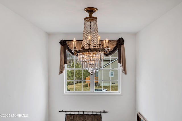 interior details with an inviting chandelier