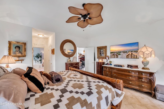 bedroom featuring connected bathroom and ceiling fan