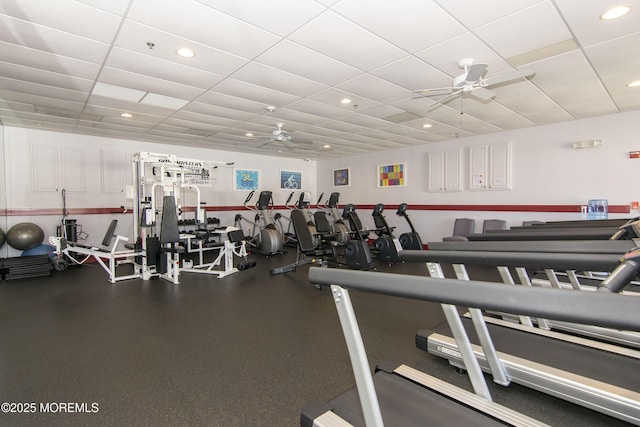 exercise room featuring recessed lighting, a paneled ceiling, and ceiling fan