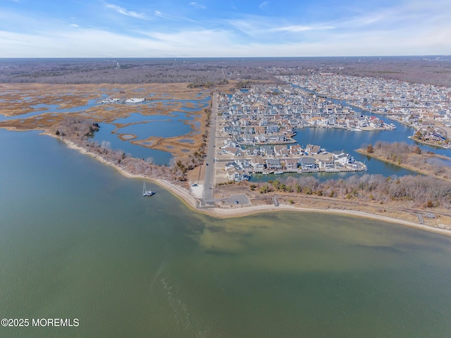 drone / aerial view featuring a water view