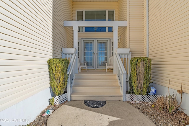 property entrance featuring french doors