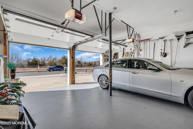 garage featuring a garage door opener