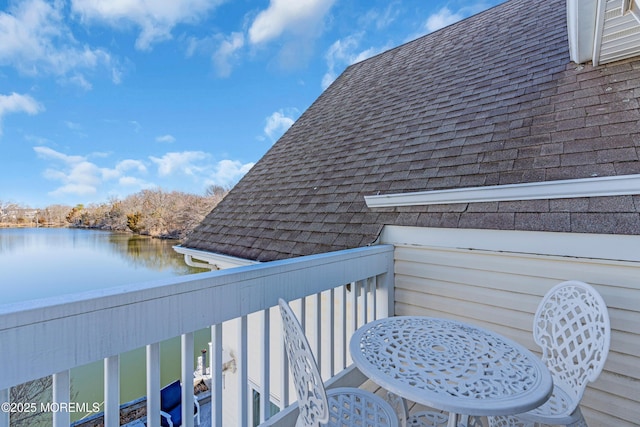 balcony featuring a water view