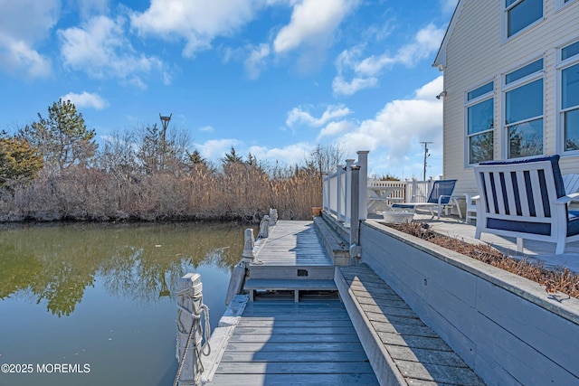 view of dock with a water view