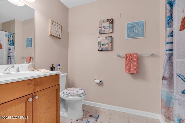 bathroom featuring vanity, a shower with curtain, baseboards, tile patterned flooring, and toilet