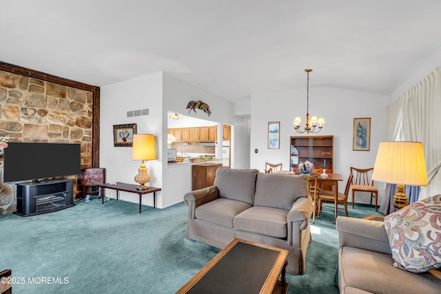 carpeted living area with a notable chandelier, visible vents, and vaulted ceiling