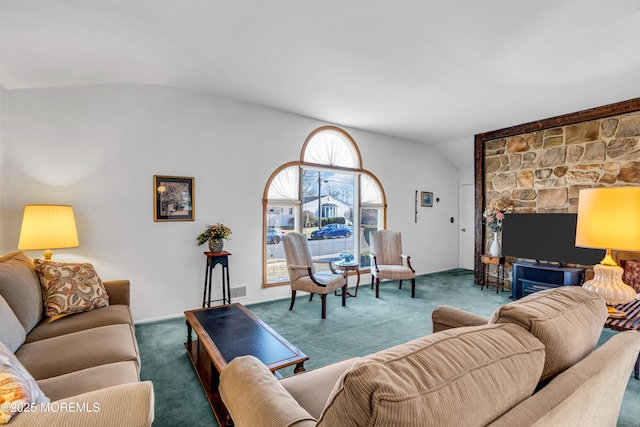 living room featuring vaulted ceiling and carpet flooring