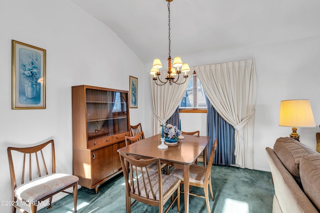 dining room with a notable chandelier, carpet flooring, and vaulted ceiling