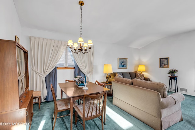 carpeted dining space with vaulted ceiling, visible vents, and a chandelier