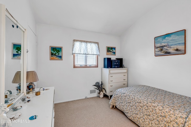 bedroom with light carpet