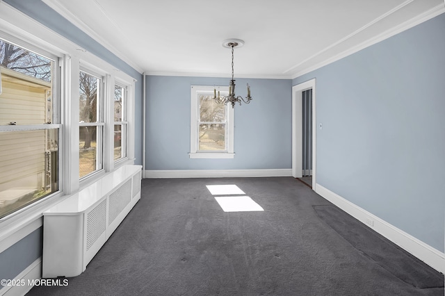 unfurnished dining area with baseboards, dark carpet, a notable chandelier, and crown molding