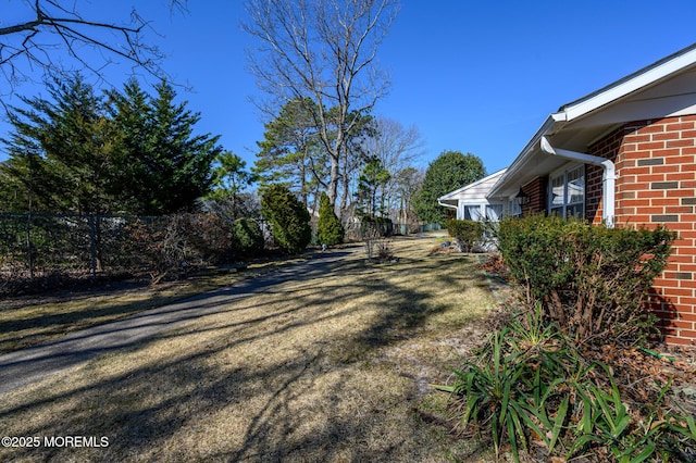 view of yard with fence