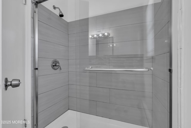 full bath featuring a stall shower