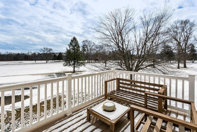 view of snow covered deck