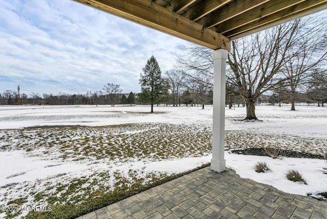 view of snow covered patio