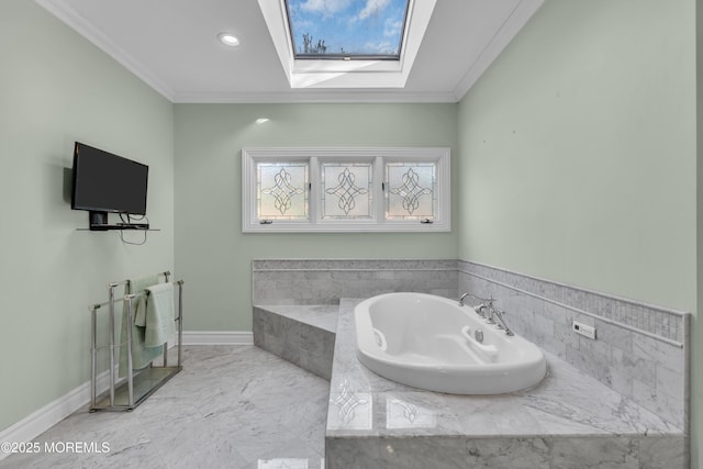 bathroom with crown molding, a skylight, a bath, and marble finish floor