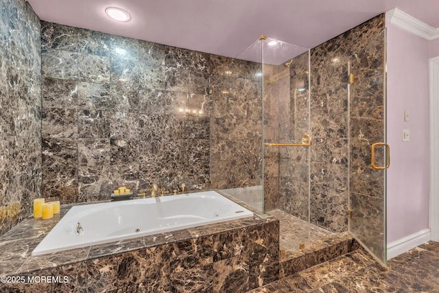 bathroom featuring tile walls, a garden tub, crown molding, and a stall shower