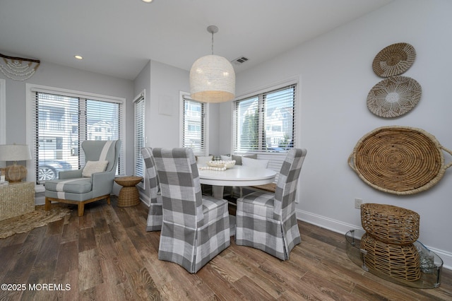 dining space featuring recessed lighting, visible vents, baseboards, and wood finished floors