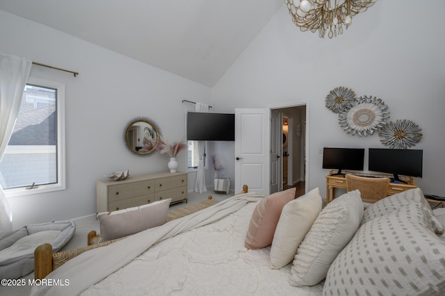 bedroom with high vaulted ceiling and a chandelier