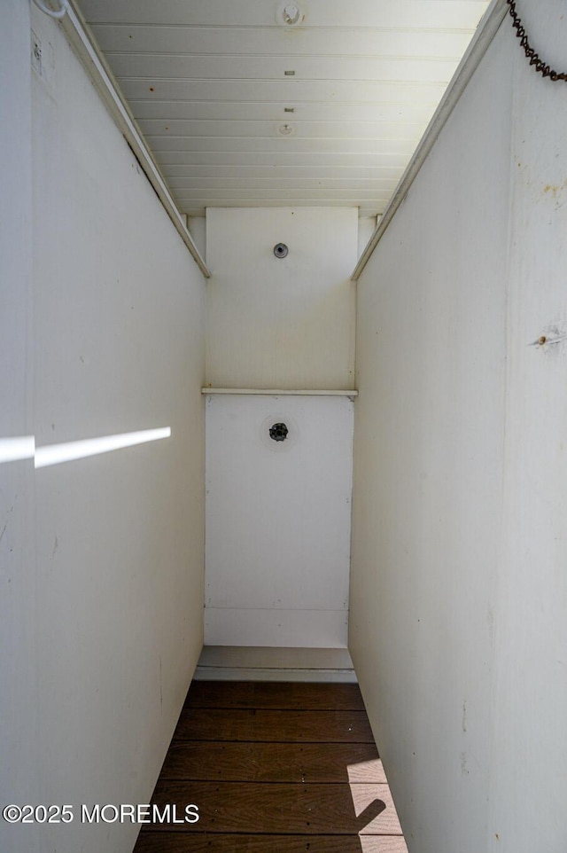 hallway with wood finished floors