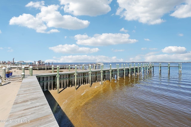 view of dock with a water view