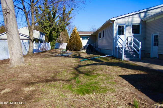 view of yard featuring fence