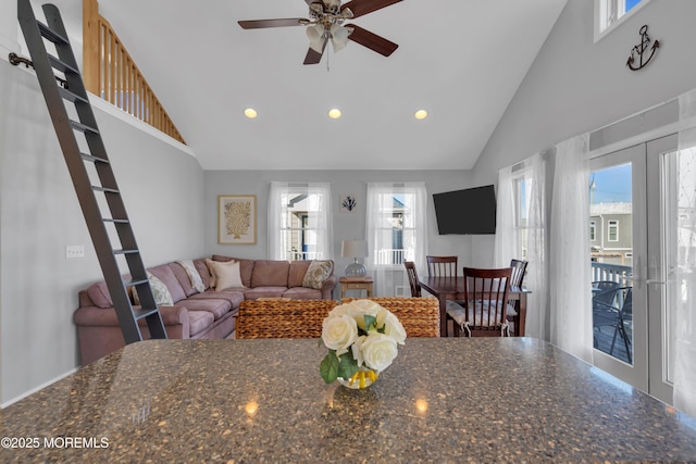 dining area with a ceiling fan, recessed lighting, french doors, and high vaulted ceiling