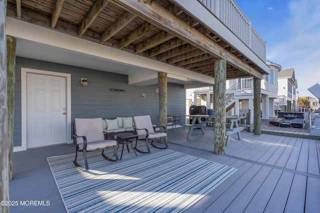 wooden deck with stairs and a residential view