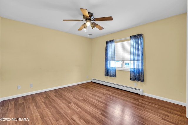 3172 Peddie St, Toms River, NJ 08753 - empty room featuring a baseboard radiator, wood finished floors, baseboards, and a ceiling fan
