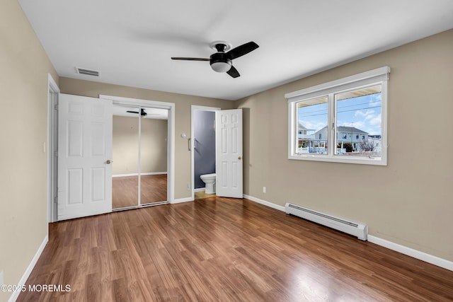 3172 Peddie St, Toms River, NJ 08753 - unfurnished bedroom featuring wood finished floors, visible vents, baseboards, and baseboard heating