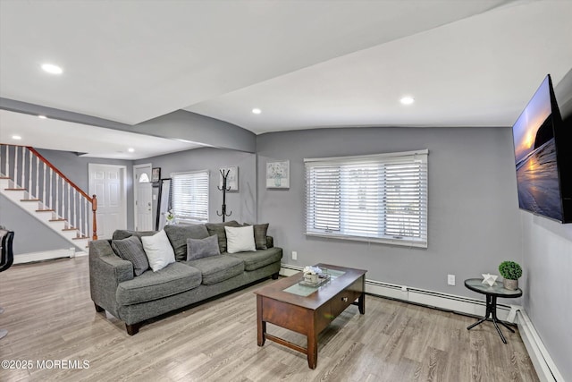 living area with stairway, recessed lighting, light wood-type flooring, and baseboards