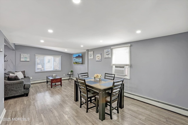 dining area with recessed lighting, cooling unit, light wood-type flooring, and a baseboard radiator