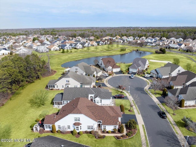 aerial view featuring a residential view and a water view