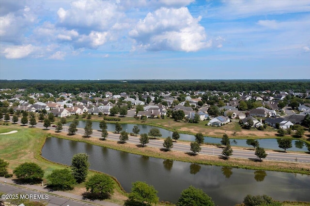 birds eye view of property with a residential view and a water view