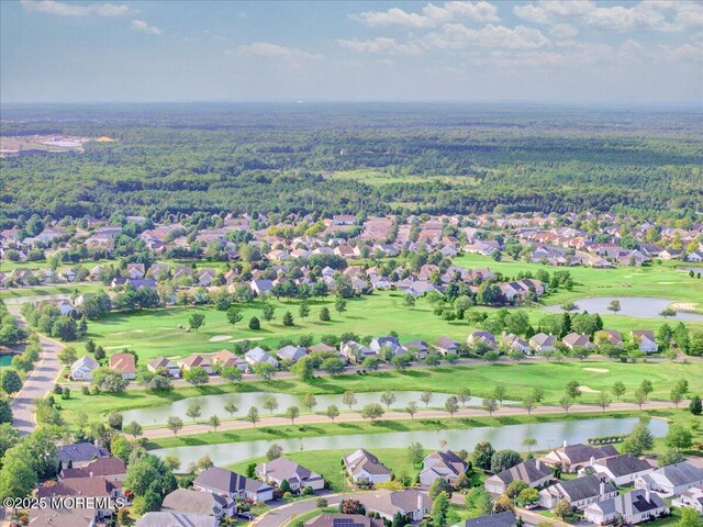 bird's eye view featuring a residential view, view of golf course, and a water view