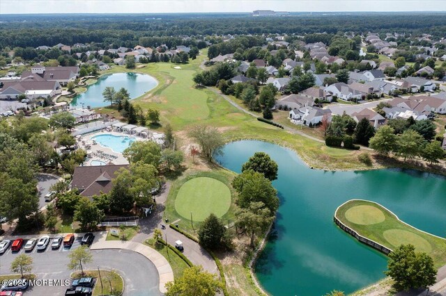 aerial view with a residential view and a water view