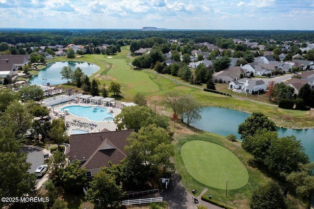 aerial view featuring a water view and view of golf course