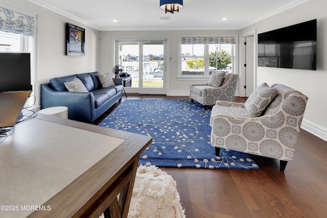 living room featuring visible vents, ornamental molding, wood finished floors, recessed lighting, and baseboards