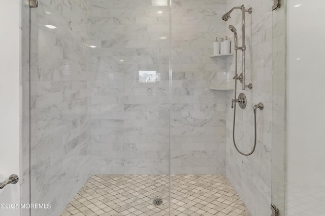 full bath featuring a shower stall