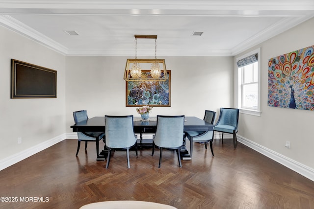 dining area with a notable chandelier, visible vents, baseboards, and ornamental molding