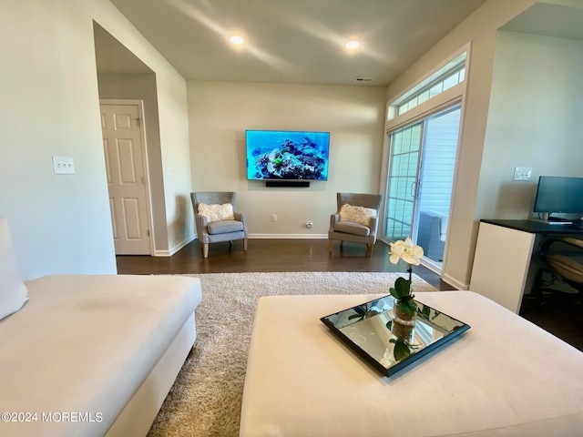 interior space with visible vents, recessed lighting, wood finished floors, and baseboards